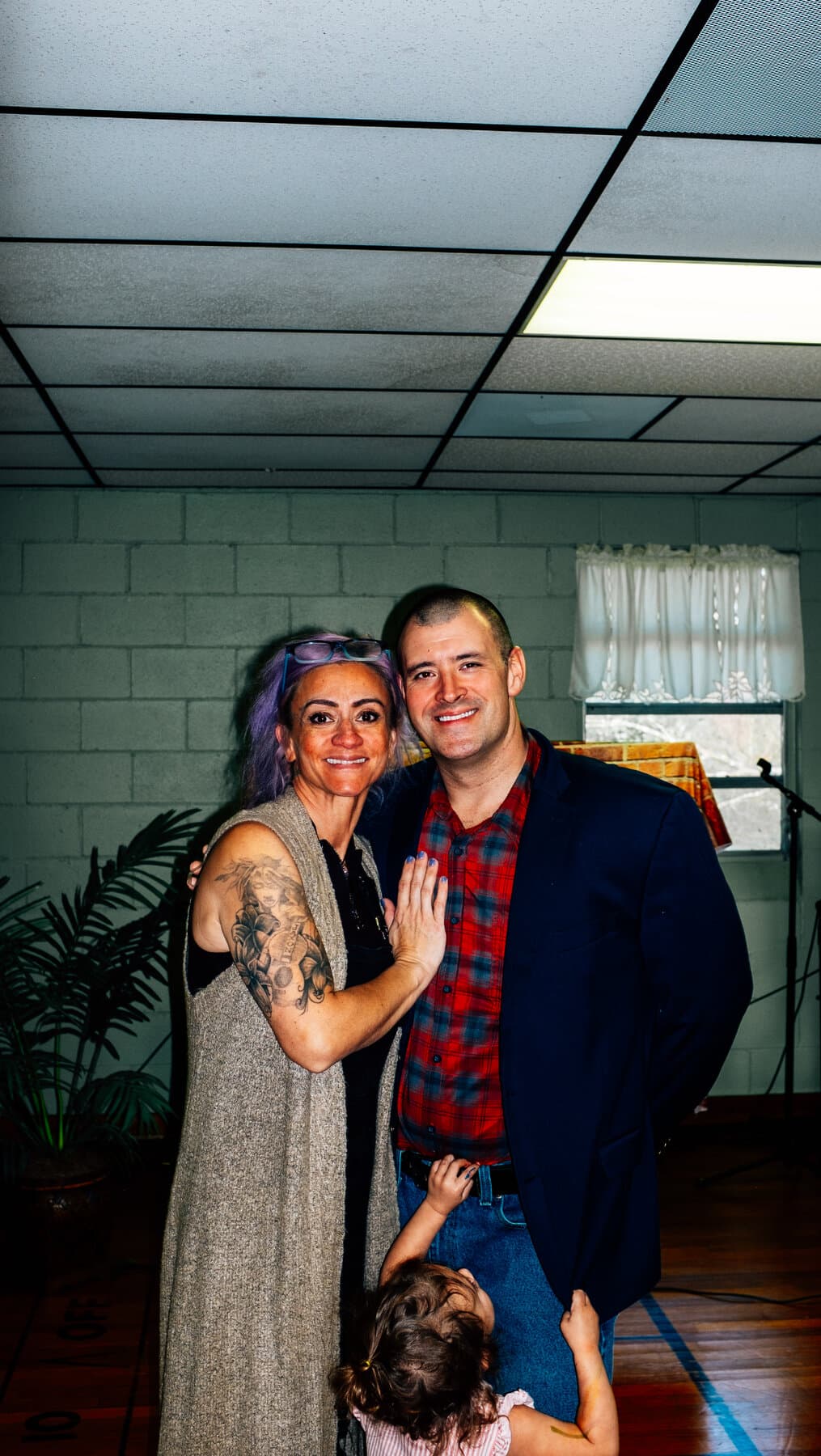 Pastor Justin Jennings and his wife Kahala Jennings with their child at Open Door Fellowship
